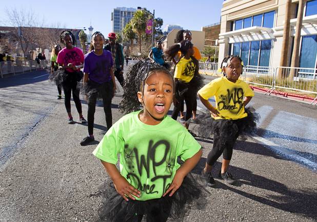 Paradise McLemore, 6, and members of the West Prep Dancers, perform during the 31st annual Dr. Martin Luther King Jr. parade in downtown Las Vegas, Monday, Jan. 21, 2013. MGM Resorts International was the presenting sponsor for the event.