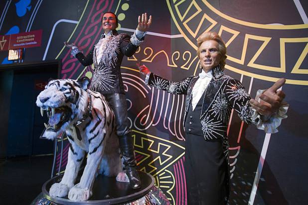 Wax figures of illusionist duo Siegfried, right, and Roy are displayed at Madame Tussauds Las Vegas wax museum in the Venetian Wednesday, Jan. 23, 2013. On Thursday, the venue will unveil a wax figure of actress Sandra Bullock.