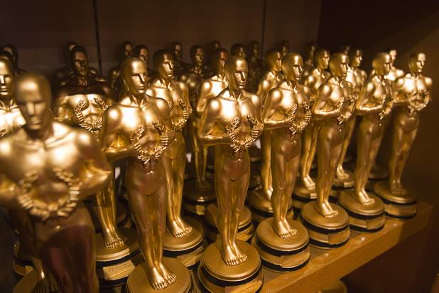 Trophy statuettes are displayed in the gift shop at Madame Tussauds Las Vegas wax attraction in the Venetian Wednesday, Jan. 23, 2013. The awards can be purchased with a customized message on the plaque. On Thursday, the venue will unveil a wax figure of actress Sandra Bullock.