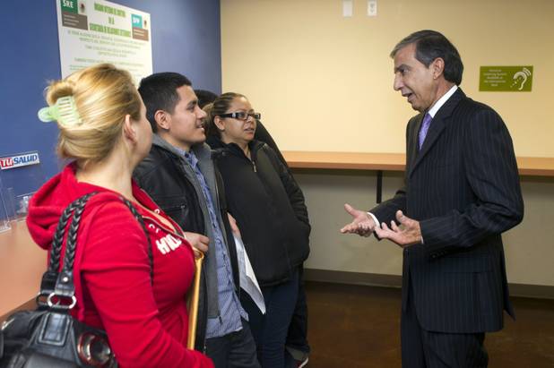 Mariano Lemus Gas, right, Mexican consul in Las Vegas, talks with Bryan Yanez, 19, center left, at the Mexican Consulate at Hoover Avenue and Sixth Street Thursday, Jan. 24, 2013. Lemus Gas is leaving after eight years in Las Vegas. STEVE MARCUS