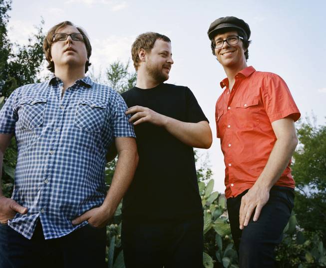 This publicity image released by Sony shows members of Ben Folds Five, from left, Robert Sledge, Darren Jessee and Ben Folds. The band's latest album, "The Sound Of The Life Of The Mind," was released on Tuesday, Sept. 18, 2012. 