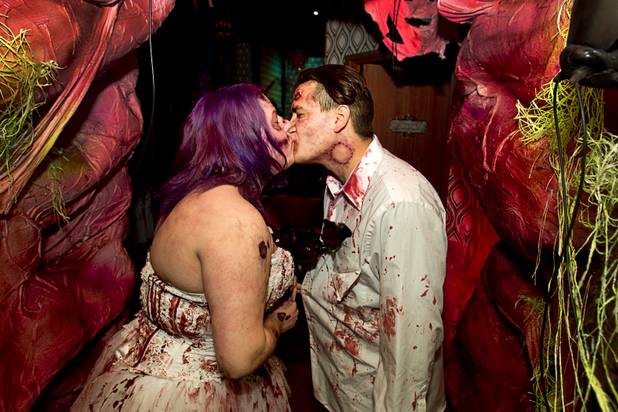 Rosie Grasso and Anthony Gallegos of Las Vegas kiss in a waiting area before getting married at Eli Roths Goretorium Sunday, Jan. 27, 2013.