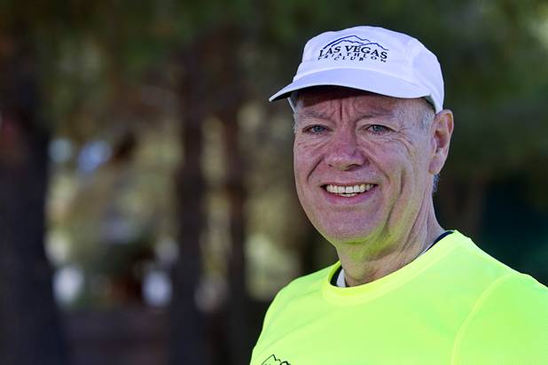 Mark Noel poses before a training run in Henderson Sunday, Jan. 27, 2013. Noel, at one time weighed more than 400 pounds, but now weighs 185 pounds and is running in the Surf City USA Marathon in California on Feb 3.