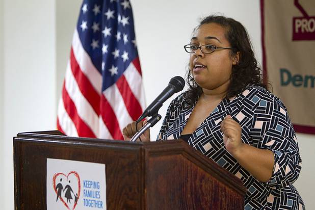 Laura Martin, communications director with the Progressive Leadership Alliance of Nevada (PLAN), speaks during a news conference calling for immigration reform at the PLAN offices in downtown Las Vegas Monday, Jan. 28, 2013.