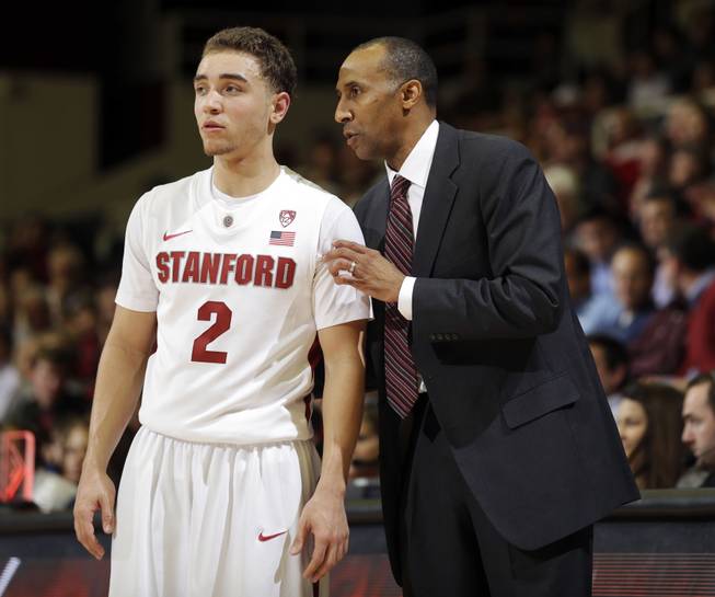 Stanford's Aaron Bright (2) gets instruction from head coach Johnny Dawkins during the second half of an NCAA college basketball game against Washington State in Stanford, Calif., Wednesday, Jan. 9, 2013. Stanford's Pac-12 Conference game Sunday against Oregon State is featured in a prop Super Bowl bet at the LVH. 