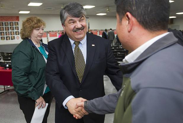 AFL-CIO President Richard Trumka, center, greets union members following a gathering of union leaders, working families and community partners at the Culinary Workers Local 226 union hall Tuesday, Jan. 29, 2013.