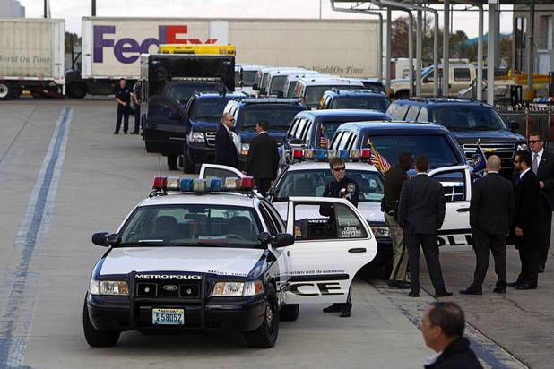A motorcade waits for President Barack Obama to arrive at McCarran International Airport in Las Vegas, Nevada Tuesday, Jan. 29, 2013.