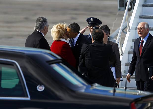 President Barack Obama gives a kiss to Las Vegas Mayor Carolyn Goodman as he arrives to kick off his public push for immigration reform in Las Vegas, Nevada Tuesday, Jan. 29, 2013.