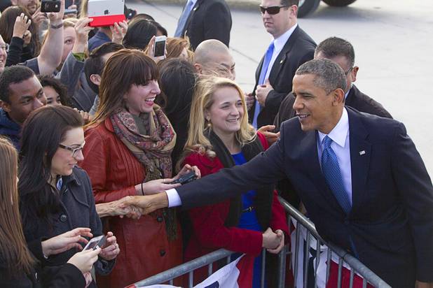 President Barack Obama meets guests as he arrives to kick off his public push for immigration reform in Las Vegas, Nevada Tuesday, Jan. 29, 2013.