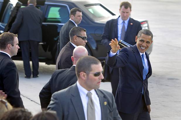 President Barack Obama waves to guests as he arrives to kick off his public push for immigration reform in Las Vegas, Nevada Tuesday, Jan. 29, 2013.