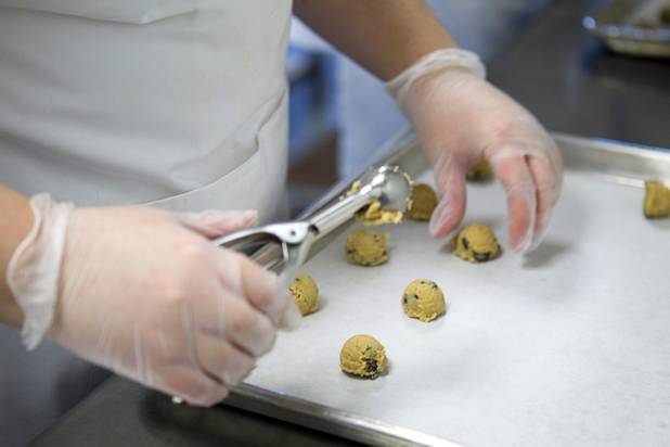 Amanda Coatney prepares a tray of gluten-free cookies at Jadon Foods, 4343 N. Rancho Drive, Wednesday, Jan. 30, 2013. Jadon Foods is a gluten-free bakery that also specializes in diabetic-friendly and dairy-free baked goods.
