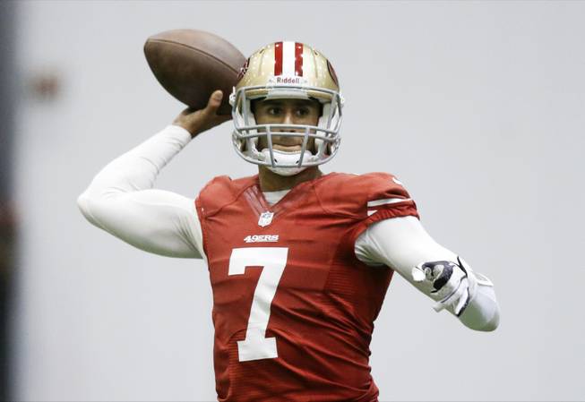 San Francisco 49ers quarterback Colin Kaepernick passes during practice on Wednesday, Jan. 30, 2013, in New Orleans.