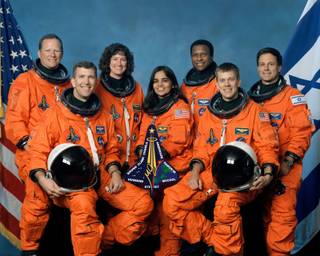 This photo released by NASA shows STS-107 crew members in their group photo. Space Shuttle Columbia crew, left to right, front row, Rick Husband, Kalpana Chawla, William McCool, back row, David Brown, Laurel Clark, Michael Anderson and Israeli astronaut Ilan Ramon are shown in this undated crew photo. NASA declared an emergency and feared the worst after losing communication with space shuttle Columbia as the ship and its seven astronauts soared over Texas several minutes before its expected landing Saturday, Feb. 1, 2003. 