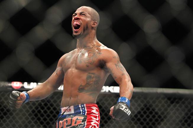 Bobby Green celebrates his submission of Jacob Volkmann in the third round of their bout at UFC 156 Saturday, Feb. 2, 2013 at the Mandalay Bay Events Center.