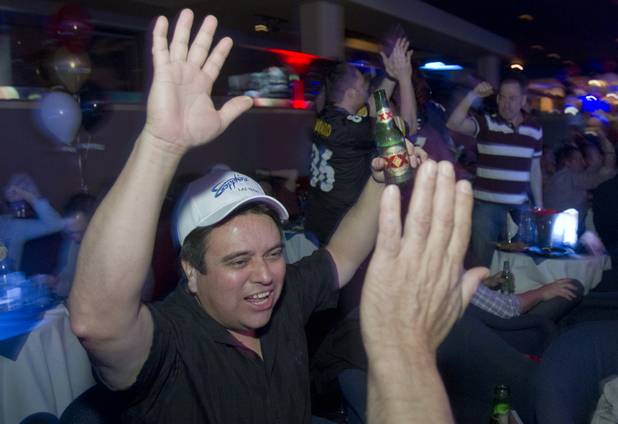 Art Trejo of Chino Hills, Calif. celebrates a Ravens touchdown during a Super Sunday party at the Sapphire Las Vegas strip club Sunday, Feb. 3, 2013. Trejo was also celebrating his birthday, he said.