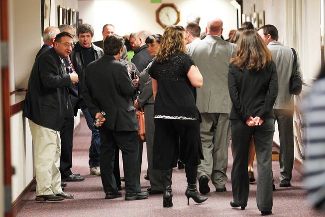 People clog a hallway in the Nevada Legislative Building on the first day of the 2013 legislative session Monday, Feb. 4, 2013 in Carson City.