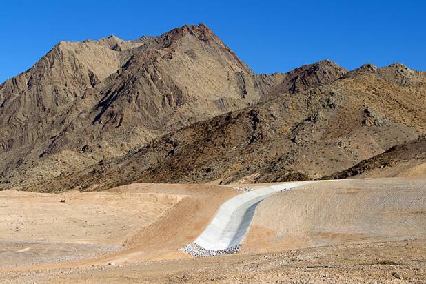 A flood control channel is shown on the Sunrise Landfill during a tour Tuesday, Feb. 5, 2013. In 1998, a storm damaged the landfill cap, sending waste into the Las Vegas Wash and Lake Mead. The tour marked the completion of $36 million in storm control construction.