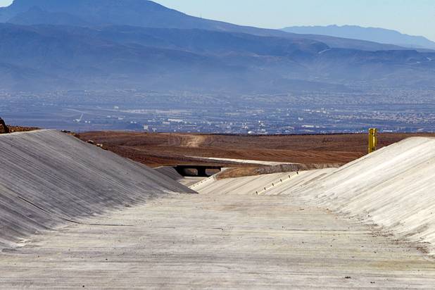 A flood control channel is shown on the top of Sunrise Landfill during a media tour Tuesday, Feb. 5, 2013. In 1998, a storm damaged the landfill cap, sending waste into the Las Vegas Wash and Lake Mead. The tour marked the completion of $36 million in storm control construction.
