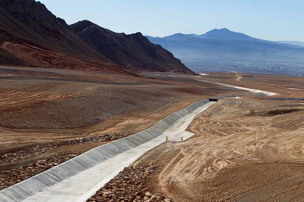 A flood control channel is shown on the top of Sunrise Landfill during a media tour Tuesday, Feb. 5, 2013. In 1998, a storm damaged the landfill cap, sending waste into the Las Vegas Wash and Lake Mead. The tour marked the completion of $36 million in storm control construction.