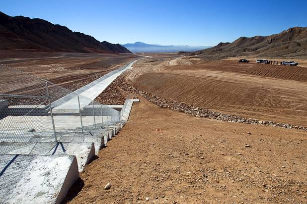 Flood control projects are shown on the top of Sunrise Landfill during a media tour Tuesday, Feb. 5, 2013. In 1998, a storm damaged the landfill cap, sending waste into the Las Vegas Wash and Lake Mead. The tour marked the completion of $36 million in storm control construction.