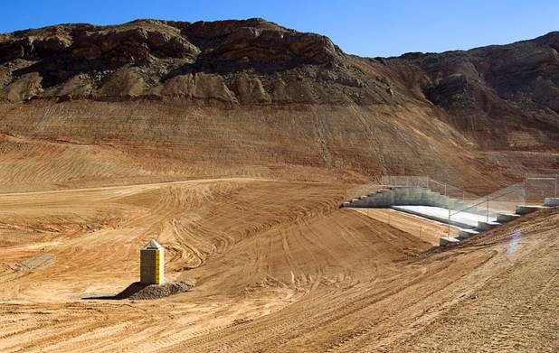A water intake, left, is shown in a flood control reservoir during a tour of Sunrise Landfill Tuesday, Feb. 5, 2013. In 1998, a storm damaged the landfill cap, sending waste into the Las Vegas Wash and Lake Mead. The tour marked the completion of $36 million in storm control construction.