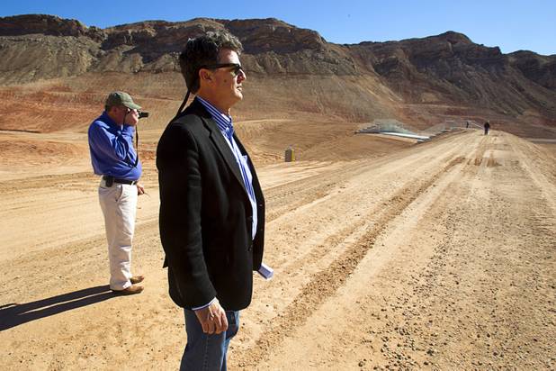 Eddie Ridenour, left, an environmental health supervisor for Southern Nevada Health District, and Jeff Scott, Environmental Protection Agency waste management division director for region 9, look over the Sunrise Landfill during a media tour Tuesday, Feb. 5, 2013. In 1998, a storm damaged the landfill cap, sending waste into the Las Vegas Wash and Lake Mead. The tour marked the completion of $36 million in storm control construction.