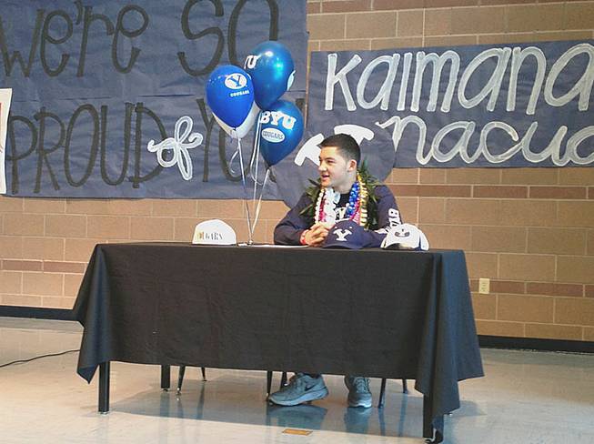 Liberty football player Kai Nacua signed a national letter of intent Wednesday, Feb. 6, in their school's gymnasium. He'll play for Brigham Young University.