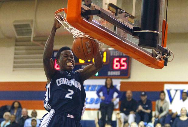 Centennial High School's Malcolm Allen dunks the ball during a game against Bishop Gorman at Bishop Gorman Thursday, Feb. 7, 2013. Bishop Gorman beat Centennial 79-71 in double overtime.