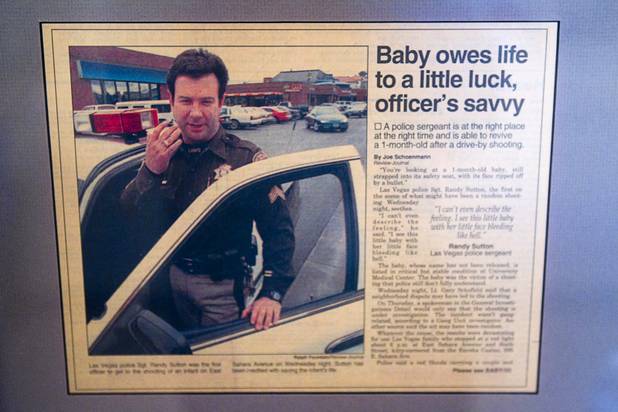 Former Metro Police Lt. Randy Sutton is shown in a 1998 newspaper article which is displayed in his home office. Sutton is working on a website called "celebrating legacy.com,"  a social directory that invites members to record and share memories about themselves, family members and their ancestors.