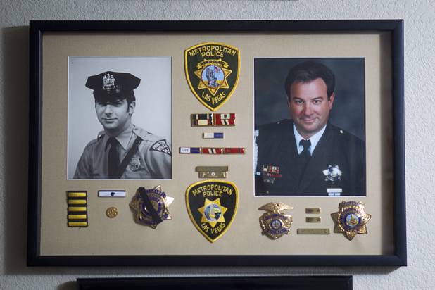 Portraits of former Metro Police Lt. Randy Sutton are shown in a display in his home Thursday, Feb. 7, 2013. The photo at left was taken in 1976 when he worked as a police officer in Princeton, N.J. At right, is a photo from about 2006. Sutton is working on a website called "celebrating legacy.com,"  a social directory that invites members to record and share memories about themselves, family members and their ancestors.