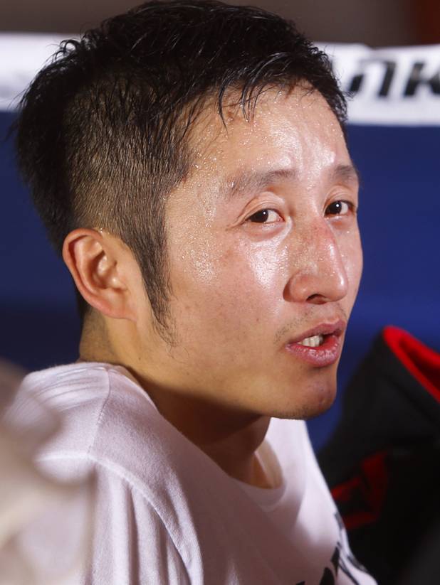 Chinese light flyweight boxer Zou Shiming is shown after a workout in a training facility at the Palazzo in Las Vegas, Nevada February 8, 2013. Zou, a two-time Olympic gold medalist and three-time world amateur champion, will make his professional debut April 6 at the Venetian Macao Resort in Macau.