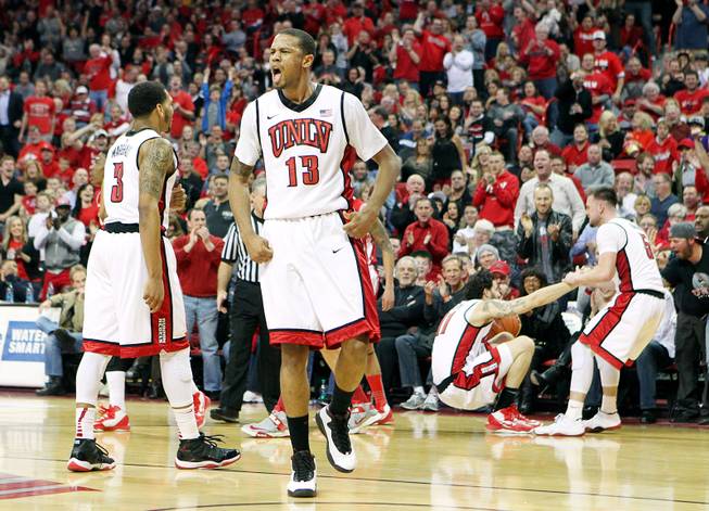 UNLV guard Bryce Dejean-Jones reacts after the Rebels recovered a loose ball against New Mexico Saturday, Feb. 9, 2013 at the Thomas & Mack Center. UNLV beat New Mexico 64-55.