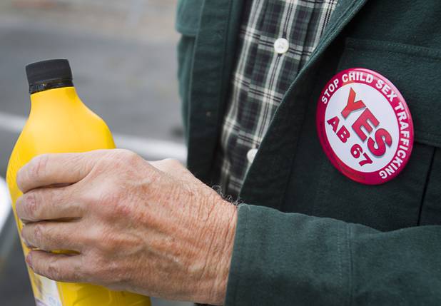 David Paulsen, a member of United Methodist Church in Boulder City, wears a button supporting Assembly Bill 67 as he heads to Carson City Sunday, Feb. 10, 2013. Nevadans for the Common Good, a coalition of faith-based organizations, are learning about the legislative process as they lobby for Assembly Bill 67. The bill would strengthen the laws against sex traffickers.