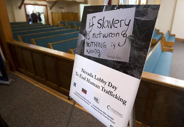 A sign is posted at the First United Methodist Church, a meeting place for members of Nevadans for the Common Good, in Carson City Monday, Feb. 11, 2013. The group, a coalition of faith-based organizations, is learning about the legislative process as they lobby for Assembly Bill 67. The bill would strengthen the laws against sex traffickers.