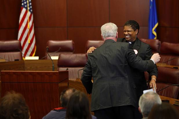 Camille Pentsil, of Zion United Methodist Church in North Las Vegas, greets Assemblyman John Hambrick (R-Assembly District 2) as he arrives to speak at a news conference at the State Legislature in Carson City Monday, Feb. 11, 2013. Nevadans for the Common Good, a coalition of faith-based organizations, are learning about the legislative process as they lobby for Assembly Bill 67. The bill would strengthen the laws against sex traffickers.