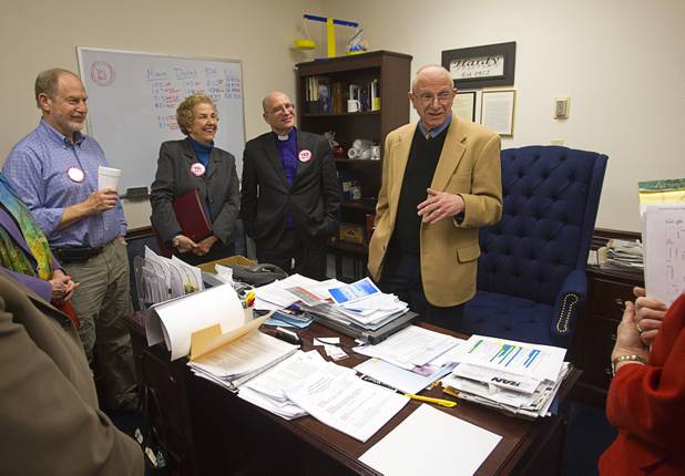 Senate Minority Whip Joe Hardy, center, talks with members of Nevadans for the Common Good in his office in Carson City on Monday, Feb. 11, 2013. The group, a coalition of faith-based organizations, is learning about the legislative process as members lobby for AB67, whch would strengthen the laws against sex traffickers.