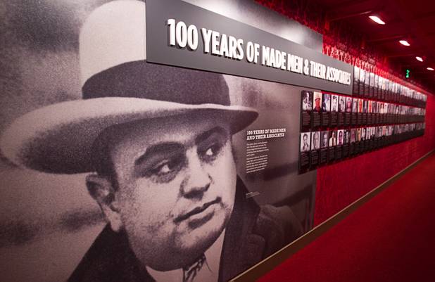 A wall is covered with photos of infamous gangsters at the Mob Museum, the National Museum of Organized Crime and Law Enforcement, in downtown Las Vegas Wednesday, Feb.13, 2013. The museum celebrates it's first anniversary on Valentine's Day.