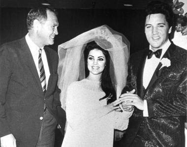 Las Vegas Sun founder Hank Greenspun with Priscilla and Elvis Presley at their wedding May 1, 1967, at the Aladdin Hotel in Las Vegas.