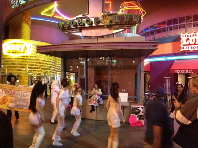A group of women dance during a performance art piece in downtown Las Vegas on Feb. 14, 2013. The event was held to bring attention to the objectification of women.  