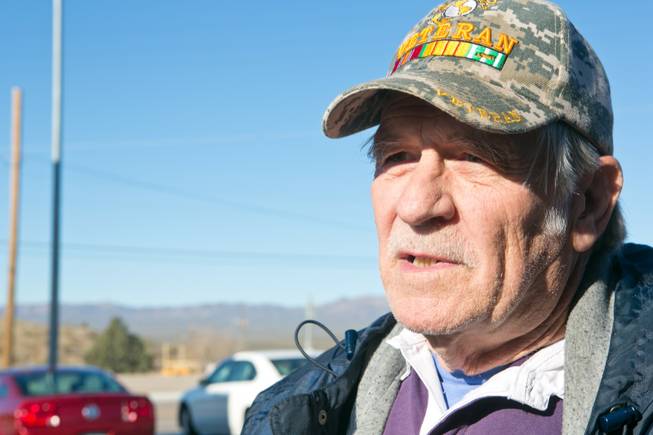 Jim Clay, a Searchlight resident, comments on the upcoming land sale in his town, Friday, Feb. 15, 2013.