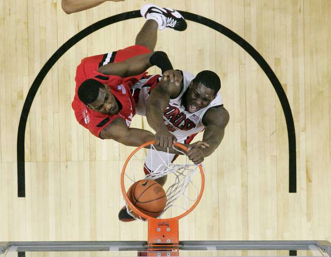 UNLV forward Anthony Bennett dunks on San Diego State forward Winston Shepard during their game Saturday, Feb. 16, 2013. UNLV won the game 72-70 to sweep the regular season series.