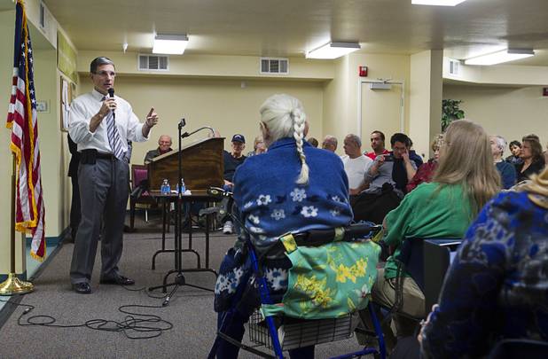 Rep. Joe Heck, R-Nev., responds to a question during a town hall meeting with constituents at Pacific Pines Senior Apartments in Henderson, Tuesday, Feb. 19, 2013.