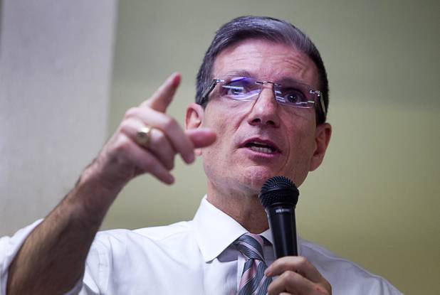 Congressman Joe Heck (R-NV) debates a point with a questioner during a town hall meeting with constituents at Pacific Pines Senior Apartments in Henderson Tuesday, Feb.19, 2013.