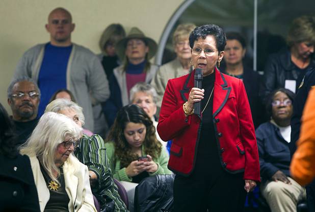 Rita Bonilla asks a question about immigration reform to Congressman Joe Heck (R-NV) during a town hall meeting at Pacific Pines Senior Apartments in Henderson Tuesday, Feb.19, 2013.