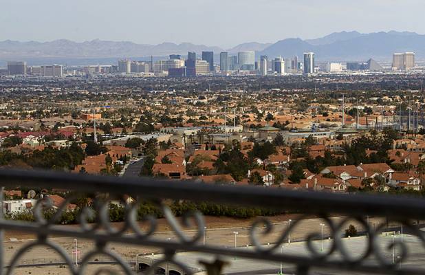 The Las Vegas Strip is viewed from the patio of a penthouse at One Queensridge Place, a luxury condo development near Summerlin, Tuesday, Feb. 19, 2013. The development is starting to see sales pick up after falling to almost nothing during the recession.