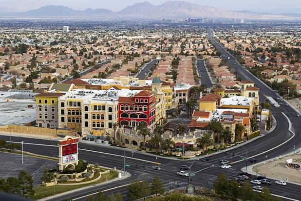 The Tivoli Village retail and dining development at 440 South Rampart Ave. is viewed from a penthouse patio at One Queensridge Place, a luxury condo high-rise near Summerlin, Tuesday, Feb. 19, 2013. One Queensridge Place is starting to see sales pick up after falling to almost nothing during the recession.