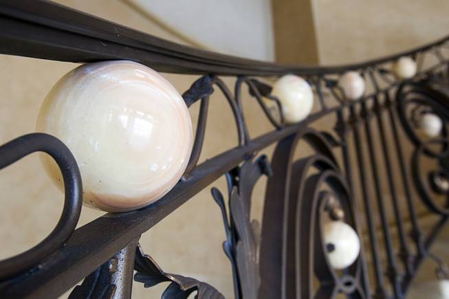 A decorative banister is shown in a penthouse at One ...