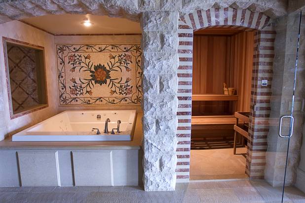 A dry sauna, right, is shown next to a hot tub in a penthouse at One Queensridge Place, a luxury condo development near Summerlin, Tuesday, Feb. 19, 2013. The unit also has a wet sauna. The development is starting to see sales pick up after falling to almost nothing during the recession.