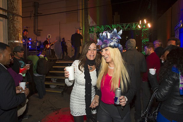 Party-goers enjoy the second annual Fashion Alley in downtown Las Vegas Wednesday, Feb. 20, 2013.