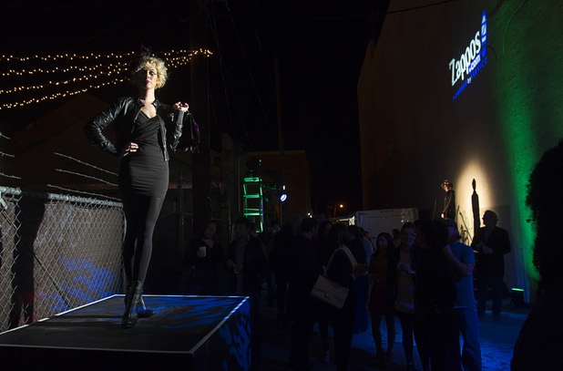 A model poses during the second annual Fashion Alley in downtown Las Vegas Wednesday, Feb. 20, 2013.